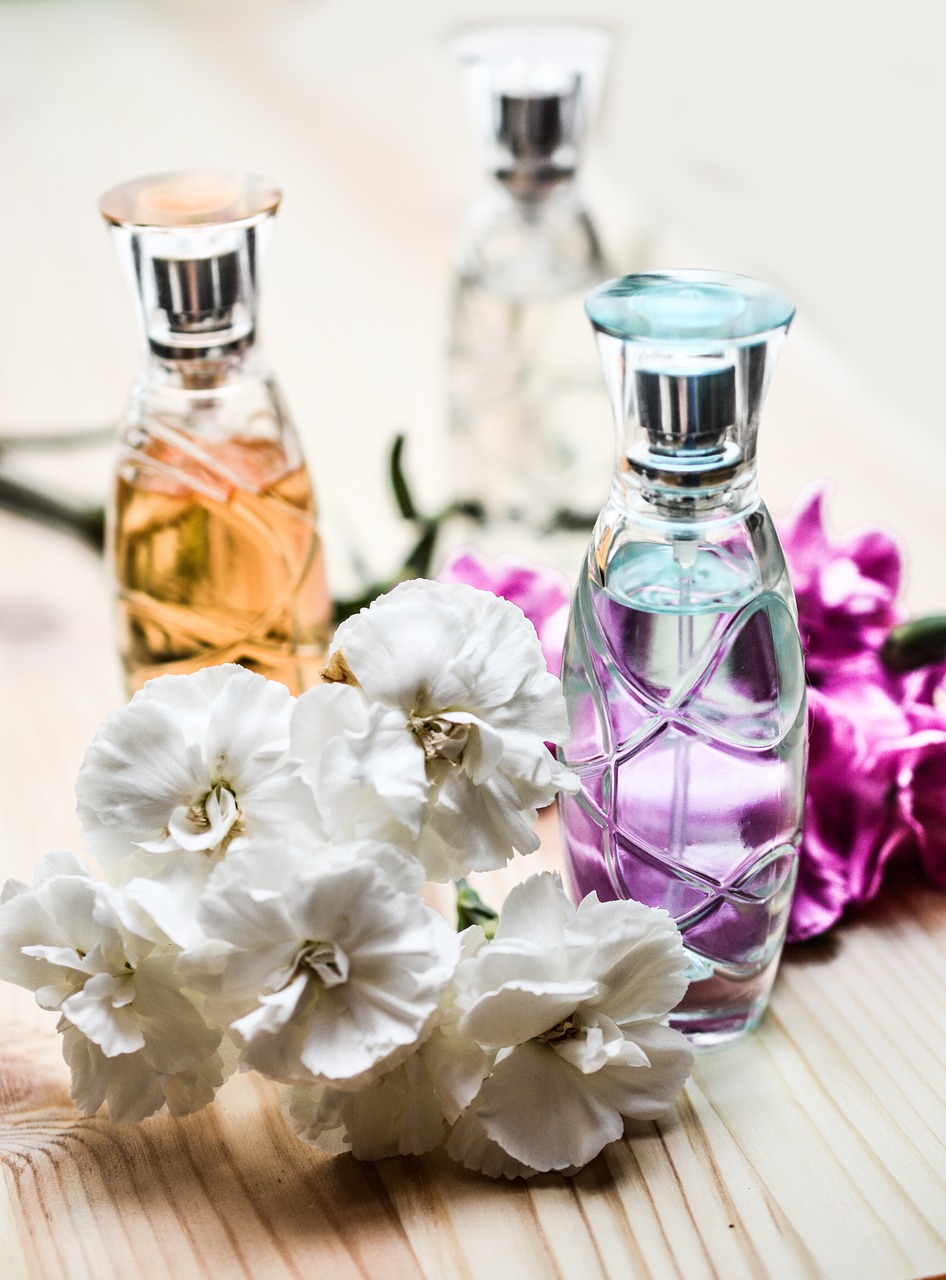 perfume, bottle, flower background-1433656.jpg